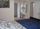 View of the main bedroom with an ensuite vanity area and closet at 10731 W Mission Ln, Sun City, AZ 85351