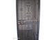 Elegant wrought iron entry door with glass panels at 10731 W Mission Ln, Sun City, AZ 85351