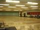 Recreational room featuring multiple shuffleboard courts at 10731 W Mission Ln, Sun City, AZ 85351