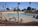 Inviting community pool with ample deck space at 10731 W Mission Ln, Sun City, AZ 85351