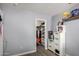Bedroom featuring a walk-in closet and decor including an open shelf with art and storage unit at 11346 E Renata Ave, Mesa, AZ 85212