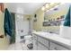Bathroom with tub, shower, and updated vanity at 1417 S Grand Dr, Apache Junction, AZ 85120