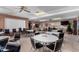 Community room with tables and chairs at 1417 S Grand Dr, Apache Junction, AZ 85120