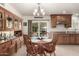 Bright dining area with wood table and hutch at 1417 S Grand Dr, Apache Junction, AZ 85120