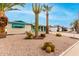 Charming mid-century home boasts attractive curb appeal and xeriscaping at 1417 S Grand Dr, Apache Junction, AZ 85120