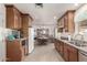Open kitchen features ample counter space and a dining area at 1417 S Grand Dr, Apache Junction, AZ 85120