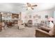 Relaxing living room with comfortable seating and ceiling fan at 1417 S Grand Dr, Apache Junction, AZ 85120