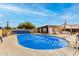 Community swimming pool with safety features at 1417 S Grand Dr, Apache Junction, AZ 85120