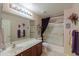 Clean bathroom with tub/shower combo and updated vanity at 143 S Los Cielos Ln, Casa Grande, AZ 85194