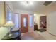 Bright entryway with tile floors and access to other rooms at 143 S Los Cielos Ln, Casa Grande, AZ 85194