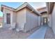 Front entryway with seating area and walkway leading to the front door at 143 S Los Cielos Ln, Casa Grande, AZ 85194