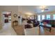 Living room with open floor plan, comfortable seating, and kitchen view at 143 S Los Cielos Ln, Casa Grande, AZ 85194