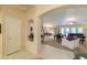 Open concept living and dining area with neutral color palette at 143 S Los Cielos Ln, Casa Grande, AZ 85194