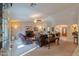 Open living room with a view of the entryway and kitchen at 143 S Los Cielos Ln, Casa Grande, AZ 85194
