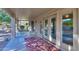 Covered patio with seating area, and access to the backyard at 143 S Los Cielos Ln, Casa Grande, AZ 85194
