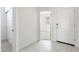 Bright entryway with tile floors and view of a room at 1447 S 239Th Dr, Buckeye, AZ 85326