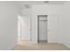 Bedroom with closet and access to another room at 1559 S 239Th Dr, Buckeye, AZ 85326