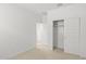 Bedroom with closet and access to another room at 1559 S 239Th Dr, Buckeye, AZ 85326
