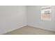 Bright bedroom with neutral walls and carpet at 1559 S 239Th Dr, Buckeye, AZ 85326
