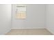Bright bedroom with neutral walls and carpet at 1559 S 239Th Dr, Buckeye, AZ 85326