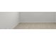 Empty bedroom with neutral wall and carpet at 1559 S 239Th Dr, Buckeye, AZ 85326