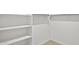 Spacious closet with shelves and hanging rod at 1559 S 239Th Dr, Buckeye, AZ 85326