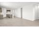 Open concept kitchen with island and stainless steel appliances at 1559 S 239Th Dr, Buckeye, AZ 85326