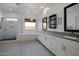 Elegant bathroom with double vanity and shower at 16637 W La Reata Ave, Goodyear, AZ 85395