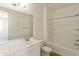 Clean bathroom, featuring a bathtub and updated vanity at 17204 W Corrine Dr, Surprise, AZ 85388