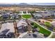 Aerial view of home and neighborhood with mountain views at 19087 E Walnut Ct, Queen Creek, AZ 85142