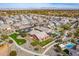 Aerial view of a beautiful community with houses and green spaces at 19087 E Walnut Ct, Queen Creek, AZ 85142