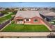 Aerial view of a home with a backyard and surrounding landscape at 19087 E Walnut Ct, Queen Creek, AZ 85142