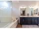 Elegant bathroom with double sinks, soaking tub and walk-in shower at 19087 E Walnut Ct, Queen Creek, AZ 85142