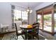 Casual dining area with sliding glass doors leading to the backyard at 19087 E Walnut Ct, Queen Creek, AZ 85142