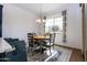 Bright dining area with a round table and four chairs at 19087 E Walnut Ct, Queen Creek, AZ 85142