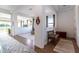 Bright and spacious entryway with wood flooring and a bench at 19087 E Walnut Ct, Queen Creek, AZ 85142