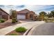 Exterior of house with stone and red accents at 19087 E Walnut Ct, Queen Creek, AZ 85142