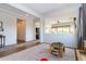 Light-filled playroom with a small table and access to other rooms at 19087 E Walnut Ct, Queen Creek, AZ 85142