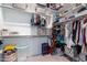 Large walk-in closet with ample shelving and hanging space at 19087 E Walnut Ct, Queen Creek, AZ 85142