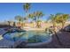 Inviting kidney shaped pool with waterfall feature at 2122 E Desert Inn Dr, Chandler, AZ 85249