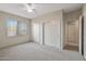 Bedroom with double closets and access to a bathroom at 22808 N Yucatan Ct, Sun City West, AZ 85375