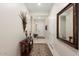 Spacious entryway with a large mirror and a console table at 24211 N 168Th Ln, Surprise, AZ 85387