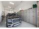 Spacious garage with ample storage cabinets and room for a truck at 24211 N 168Th Ln, Surprise, AZ 85387