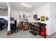 Garage workshop area with workbench and tools at 24211 N 168Th Ln, Surprise, AZ 85387