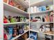 Well-stocked pantry with ample shelving for storage at 24211 N 168Th Ln, Surprise, AZ 85387
