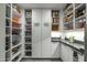 Well-organized pantry with custom shelving and ample storage at 2445 E Oregon Ave, Phoenix, AZ 85016