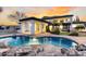 Freeform pool and spa with rock waterfall feature at 2543 E Linda Ln, Gilbert, AZ 85234