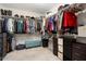Spacious walk-in closet with ample shelving and drawers at 27453 W Wahalla Ln, Buckeye, AZ 85396