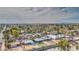 Wide aerial view showcasing the property and surrounding neighborhood, featuring distant city skyline at 2937 E Osborn Rd, Phoenix, AZ 85016