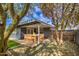 Backyard patio area with seating and a view of the surrounding landscape at 2937 E Osborn Rd, Phoenix, AZ 85016